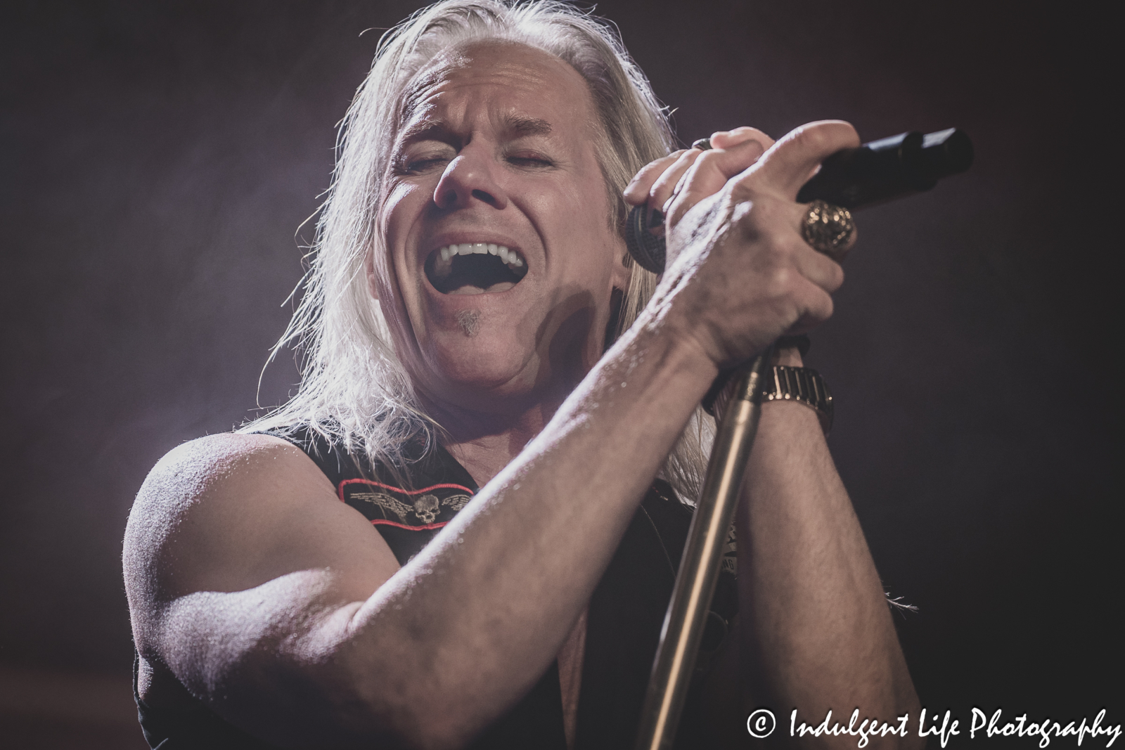 Lead singer Robert Mason of Warrant performing live at Hy-Vee Arena in Kansas City, MO on March 22, 2024.