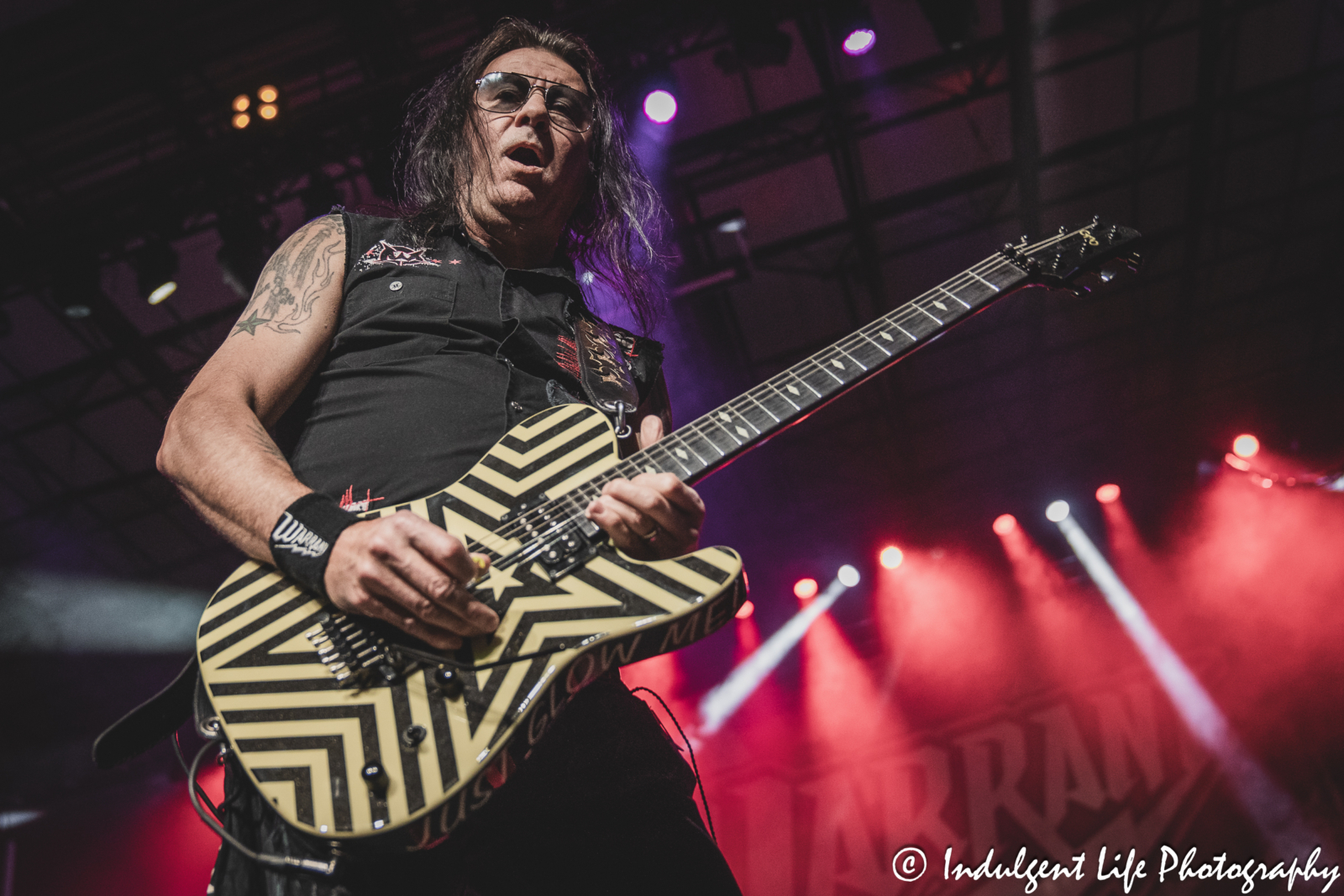 Guitar player Erik Turner of Warrant live in concert at Hy-Vee Arena in Kansas City, MO on March 22, 2024.