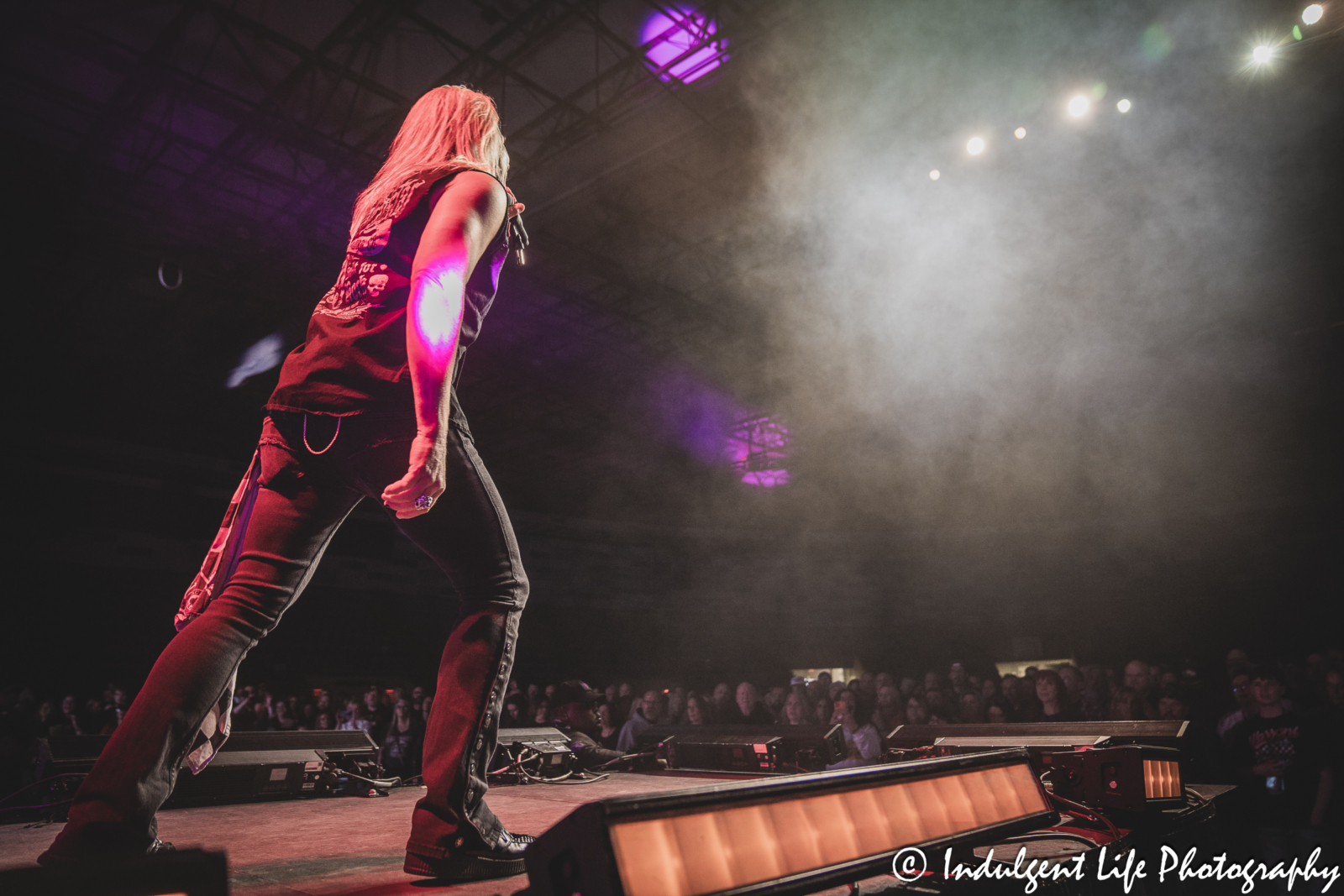 Warrant lead singer Robert Mason and fans at Hy-Vee Arena in Kansas City, MO on March 22, 2024.