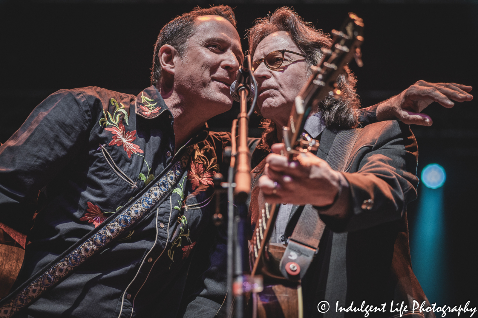 Lead singer Jack Hanna and son Jamie Hanna of Nitty Gritty Dirt Band performing together at Ameristar Casino's Star Pavilion in Kansas City, MO on March 22, 2025.