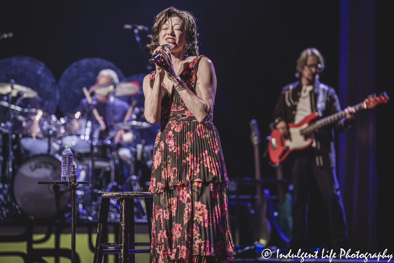 Amy Grant performing "Walk On Water" with drummer John Hammond and bass guitarist Mike Brignardello at Kauffman Center in downtown Kansas City, MO on April 4, 2025.