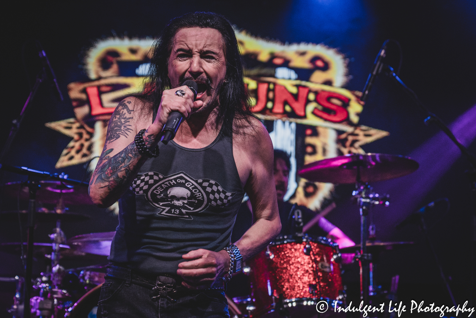 Lead singer Phil Lewis and drummer Shawn Duncan performing together at Knuckleheads Saloon in Kansas City, MO on May 22, 2025.