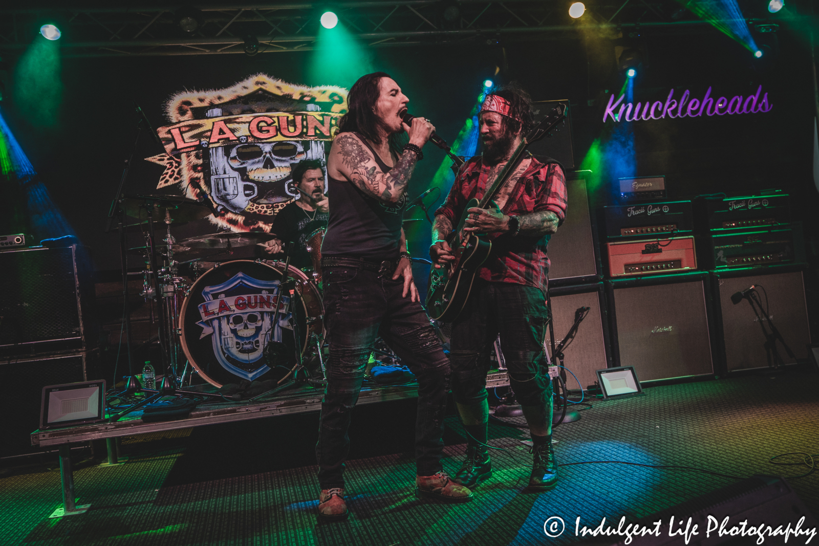 Frontman Phil Lewis, guitar player Tracii Guns and drummer Shawn Duncan of L.A. Guns performing live together at Knuckleheads Saloon in Kansas City, MO on May 22, 2025.