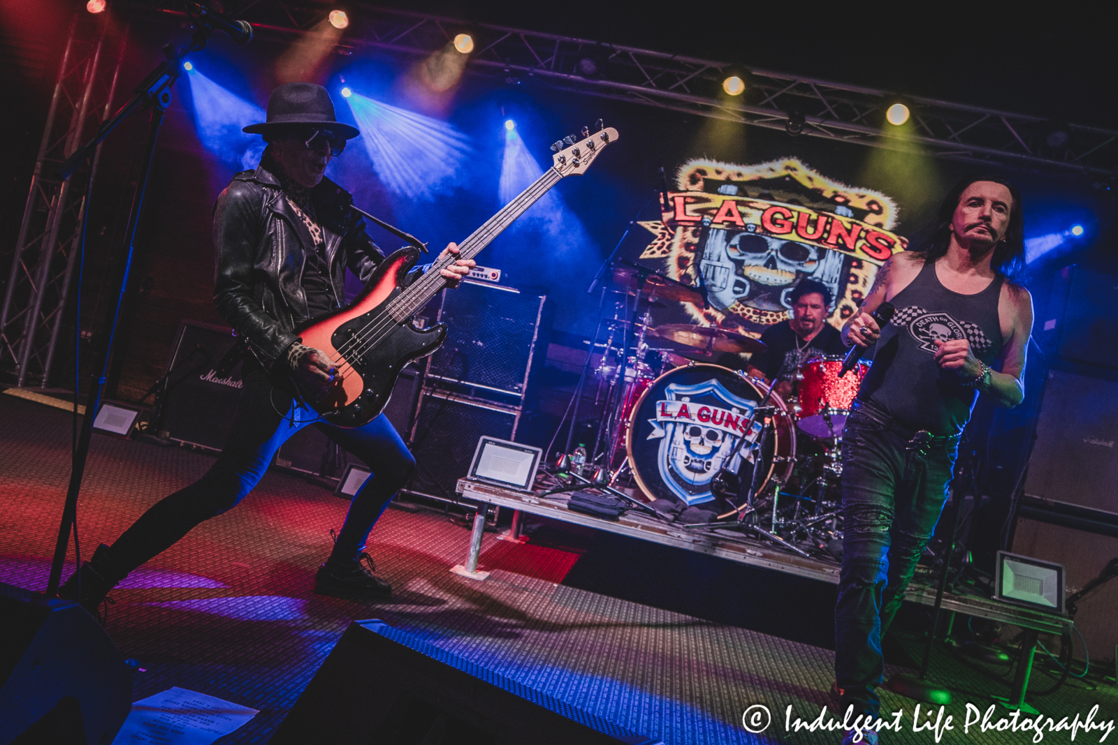 L.A. Guns bass guitarist Johnny Martin, lead singer Phil Lewis and drummer Shawn Duncan performing live together at Knuckleheads Saloon in Kansas City, MO on May 22, 2025.