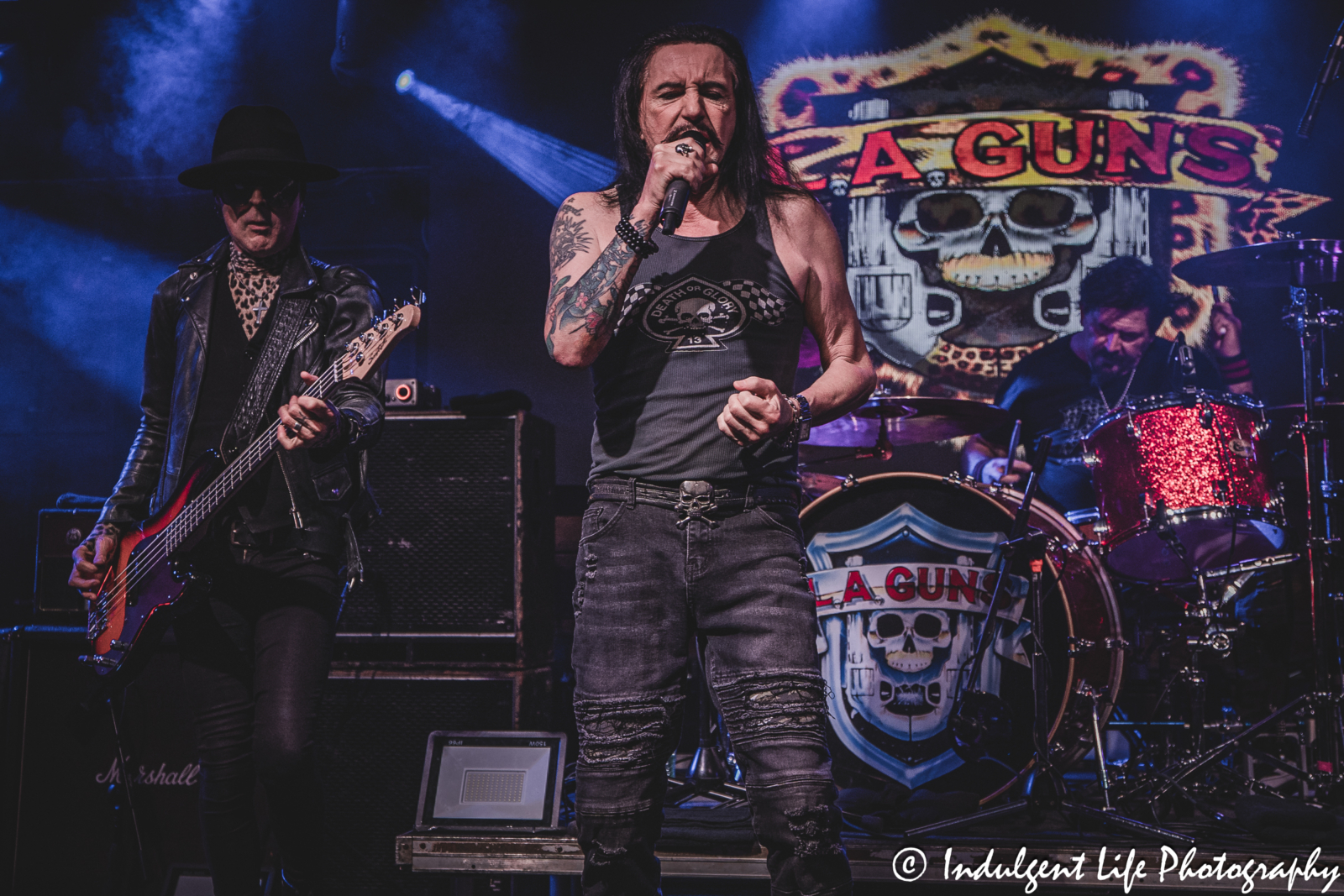 Bass guitarist Johnny Martin, frontman Phil Lewis and drummer Shawn Duncan of L.A. Guns performing live together at Knuckleheads Saloon in Kansas City, MO on May 22, 2025.