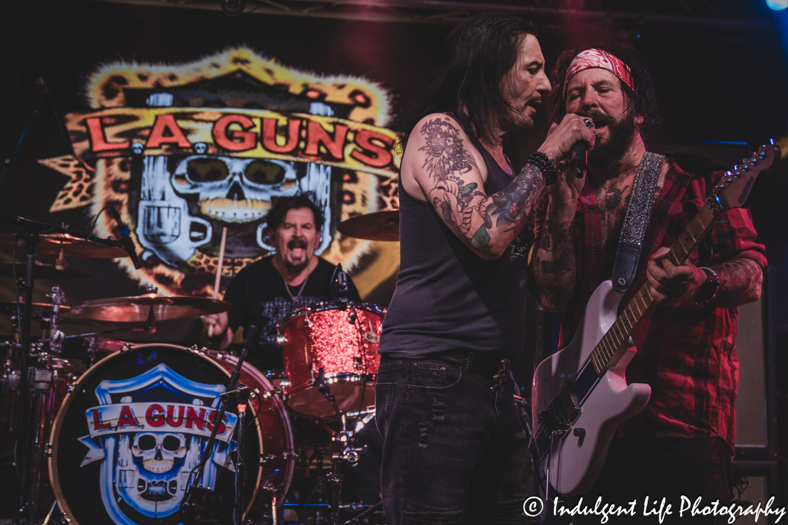 Lead singer Phil Lewis and guitarist Tracii Guns of L.A. Guns performing with drummer Shawn Duncan at Knuckleheads Saloon in Kansas City, MO on May 22, 2025.