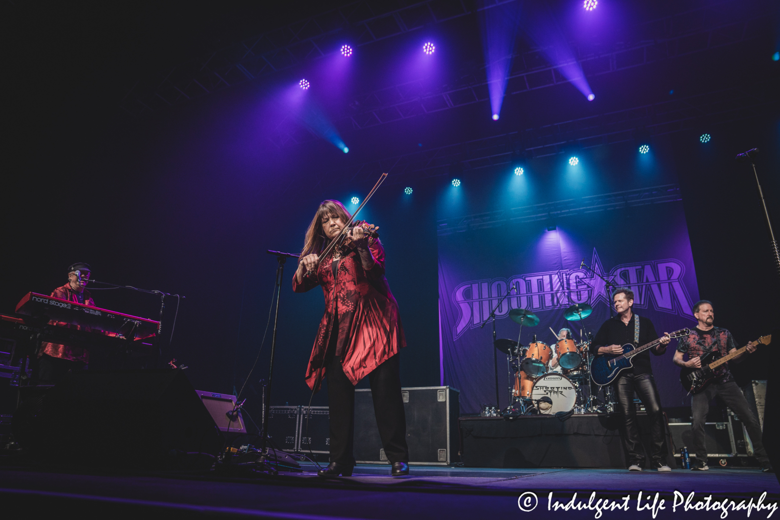 Shooting Star violinist Janet Jameson and band performing together at Star Pavilion inside of Ameristar Casino Hotel Kansas City on April 26, 2025.