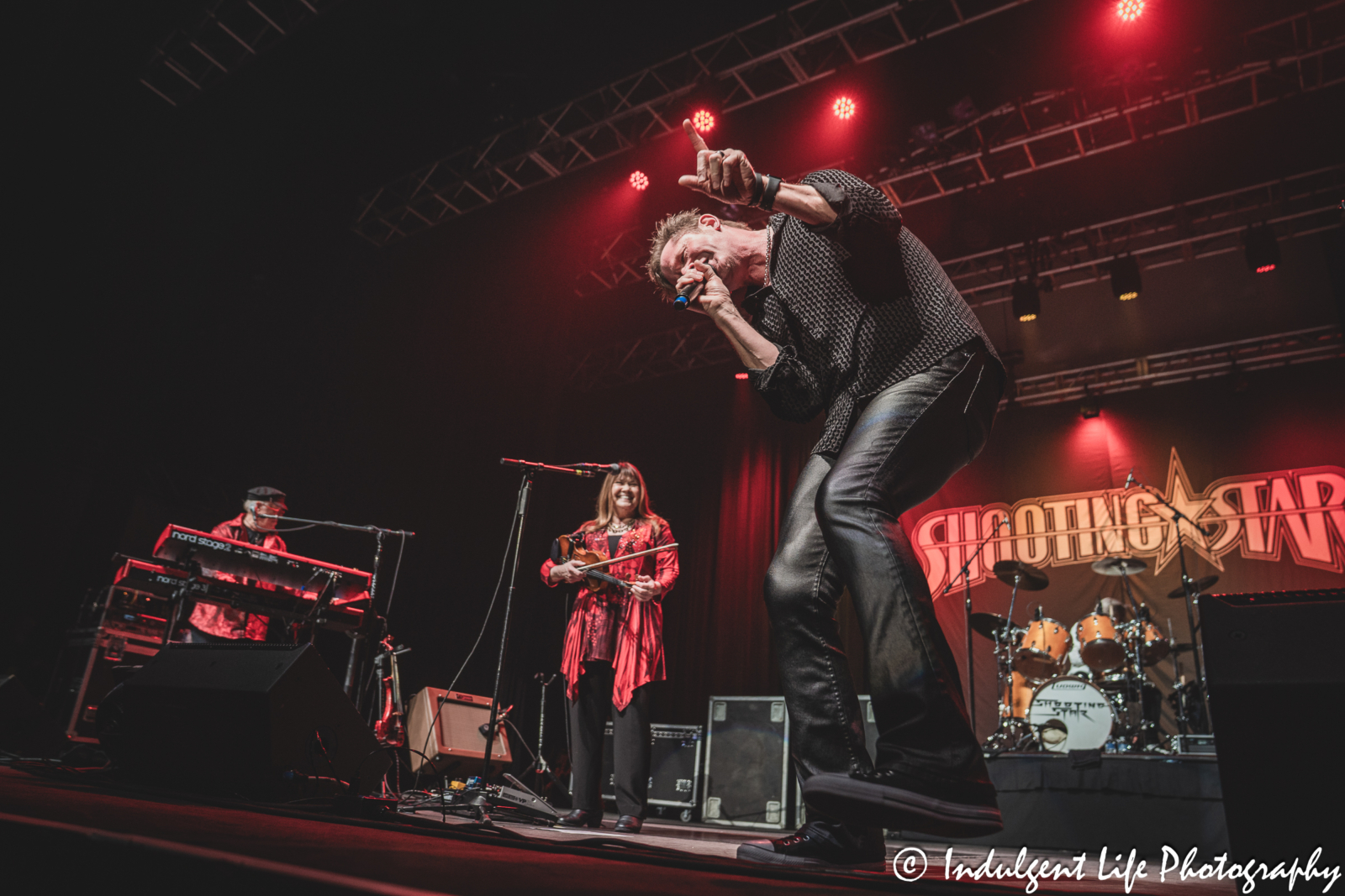 Shooting Star frontman Todd Pettygrove performing live with the band at Ameristar Casino's Star Pavilion in Kansas City, MO on April 26, 2025.