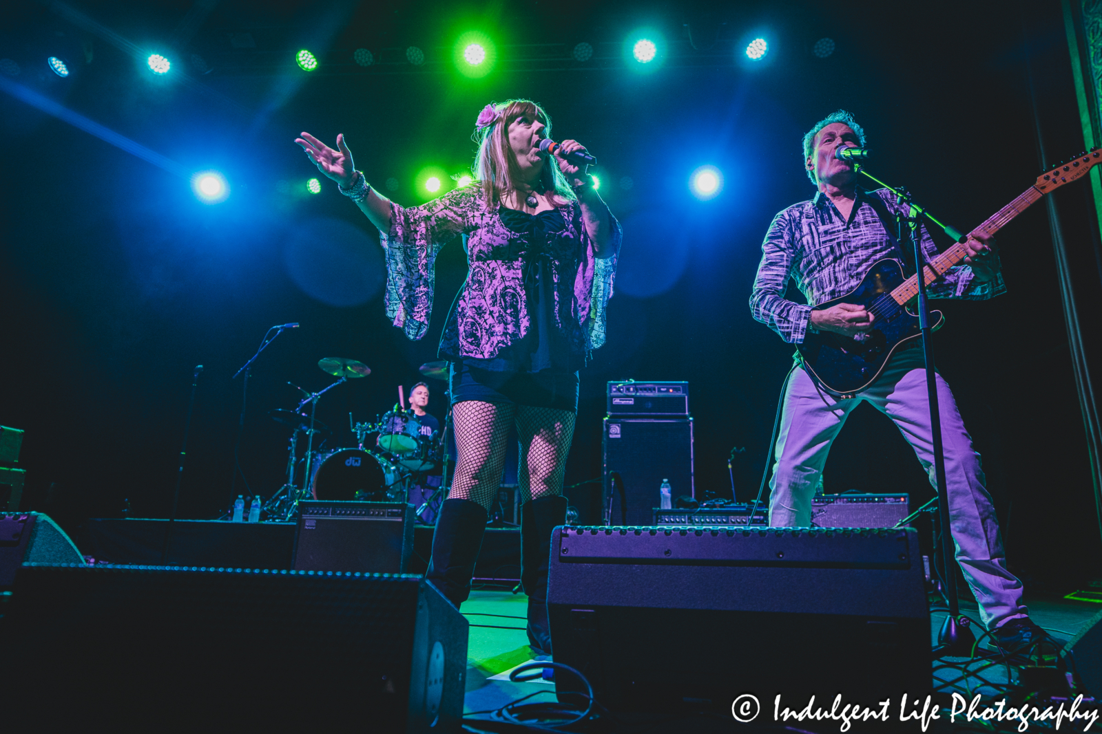 Lead singers Astrid Plane and Bill Wadhams of Animotion live in concert performing "Room to Move" with drummer Jim Blair together on the "I Love The 80's" tour at Uptown Theater in Kansas City, MO on June 13, 2025.