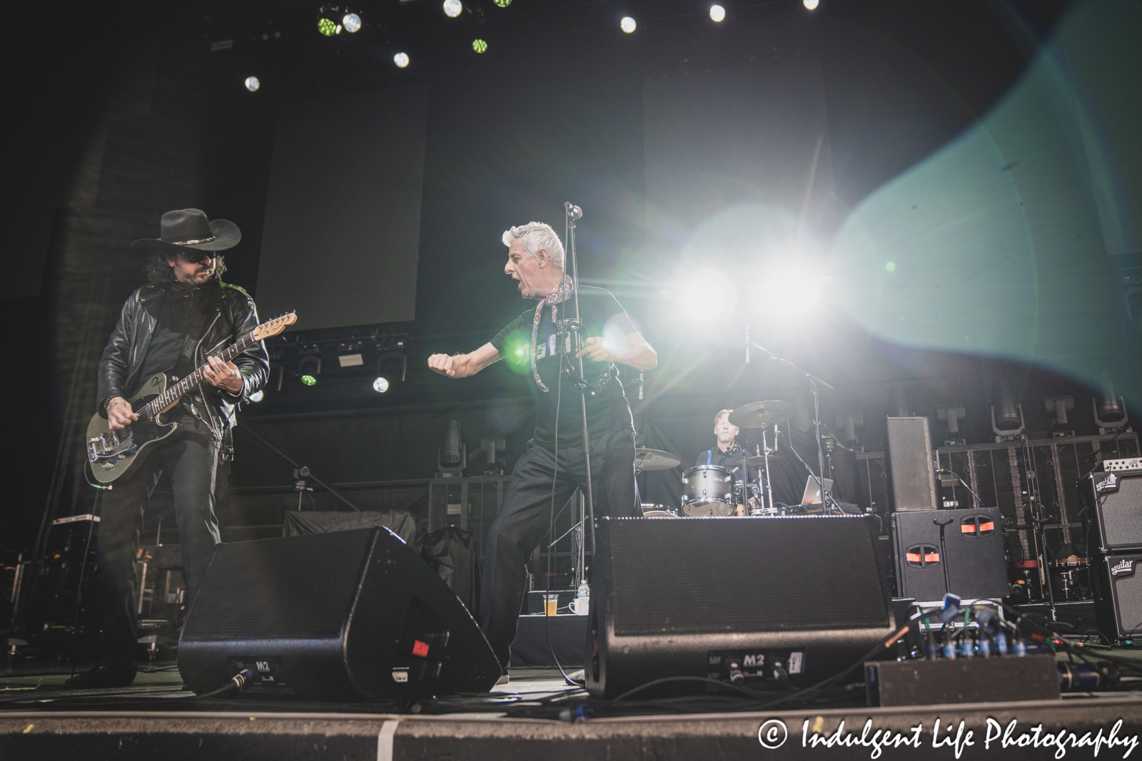 Lead singer Robbie Grey of Modern English performing "Gathering Dust" with Gabriel Sullivan and Ric Chandler at Hollywood Casino Amphitheater in Maryland Heights, MO on June 5, 2025.