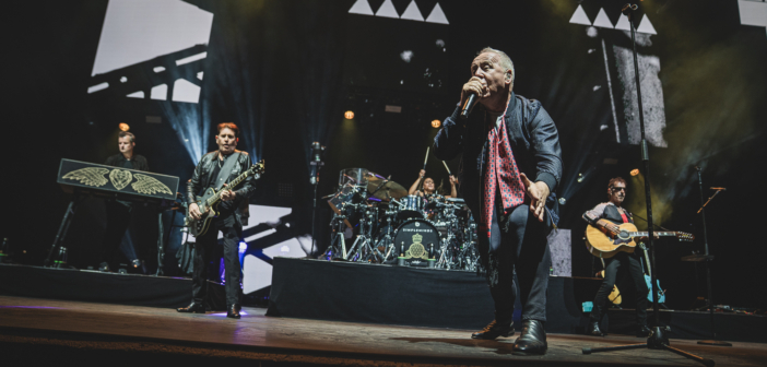 Simple Minds performed live in concert on its "Alive & Kicking" tour at Hollywood Casino Amphitheater in the St. Louis suburb of Maryland Heights, MO on June 5, 2025.