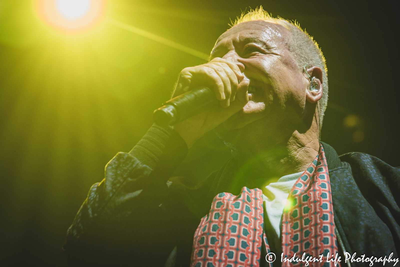 Frontman Jim Kerr of Simple Minds performing "I Travel" live in concert on the band's "Alive & Kicking" tour at Hollywood Casino Amphitheater in Maryland Heights, MO on June 5, 2025.