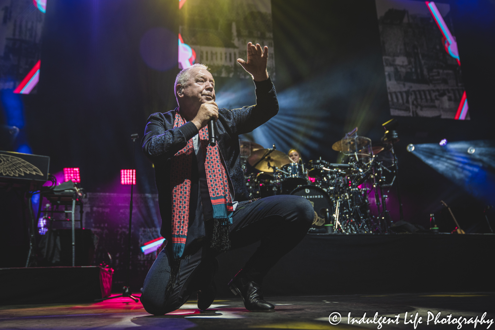 Frontman Jim Kerr and his band Simple Minds performing "I Travel" live in concert on the band's "Alive & Kicking" tour at Hollywood Casino Amphitheater in Maryland Heights, MO on June 5, 2025.