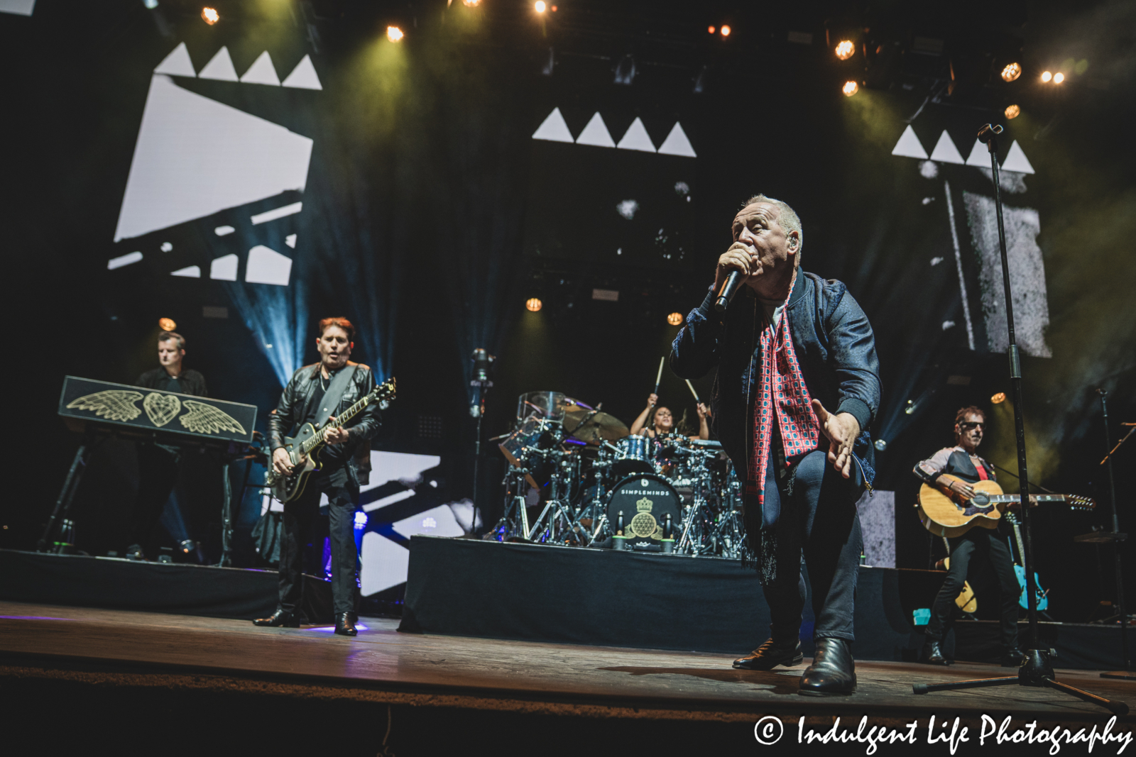 Frontman Jim Kerr and his band Simple Minds opening with "Waterfront" live in concert on the band's "Alive & Kicking" tour at Hollywood Casino Amphitheater in Maryland Heights, MO on June 5, 2025.