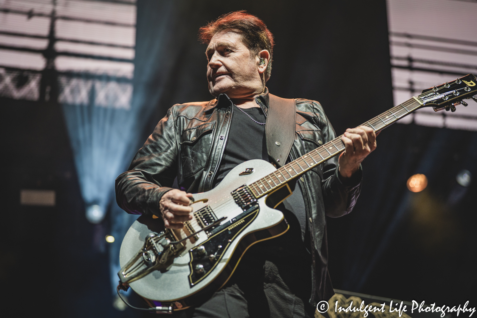 Simple Minds guitarist Charlie Burchill performing "Waterfront" live in concert on the band's "Alive & Kicking" tour at Hollywood Casino Amphitheater in Maryland Heights, MO on June 5, 2025.