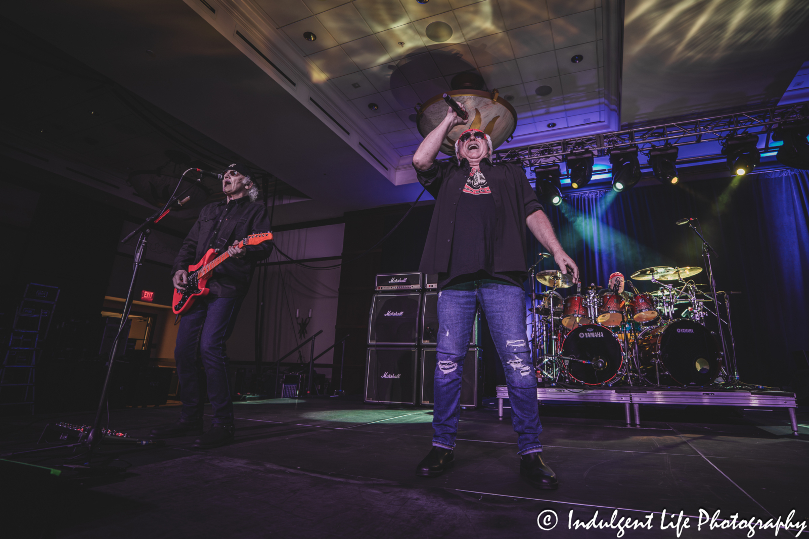 Lead singer Mike Reno and guitarist Paul Dean performing "Notorious" with drummer Matt Frenette live at Prairie Band Casino in Mayetta, KS on July 24, 2025.