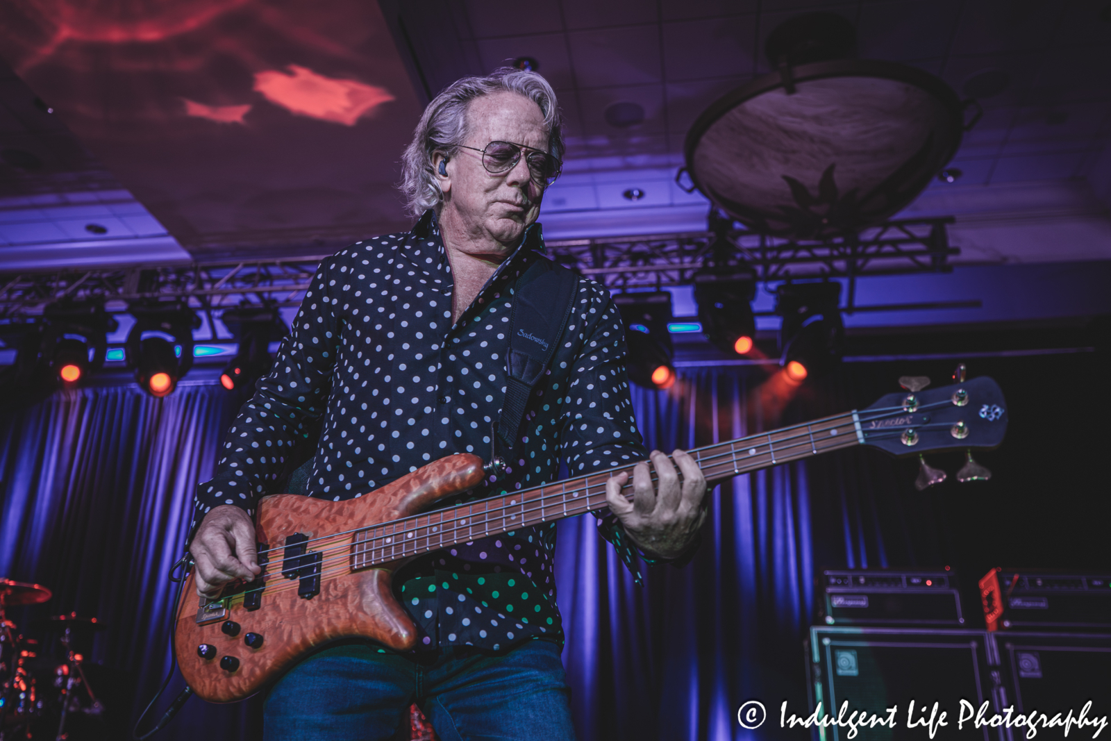 Loverboy bass guitar player Ken "Spider" Sinnaeve of live in concert performing "Lucky Ones" at Prairie Band Casino in Mayetta, KS on July 24, 2025.