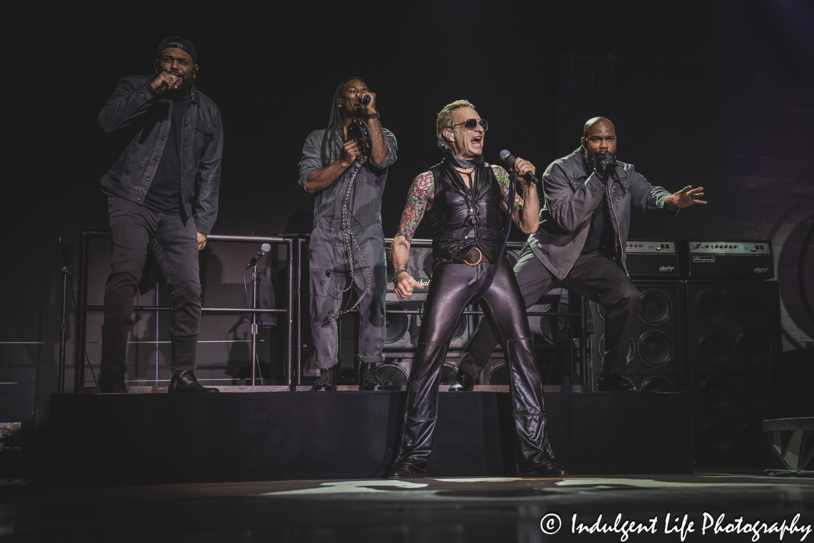 Frontman David Lee Roth of Van Halen and his backup singers performing "Drop Dead Legs" live in concert at Grinders in the Crossroads of downtown Kansas City, MO on August 27, 2025.