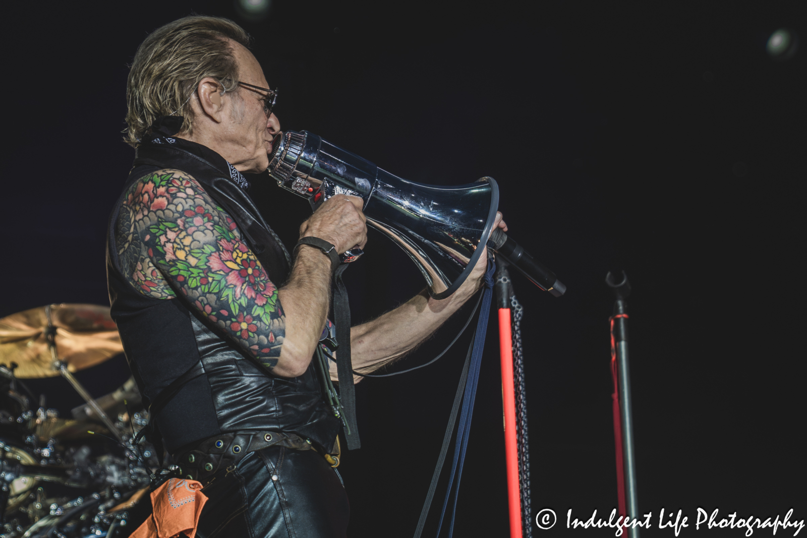 David Lee Roth of Van Halen singing "I'm the One" into the bullhorn live in concert at Grinders in the Crossroads of downtown Kansas City, MO on August 27, 2025.