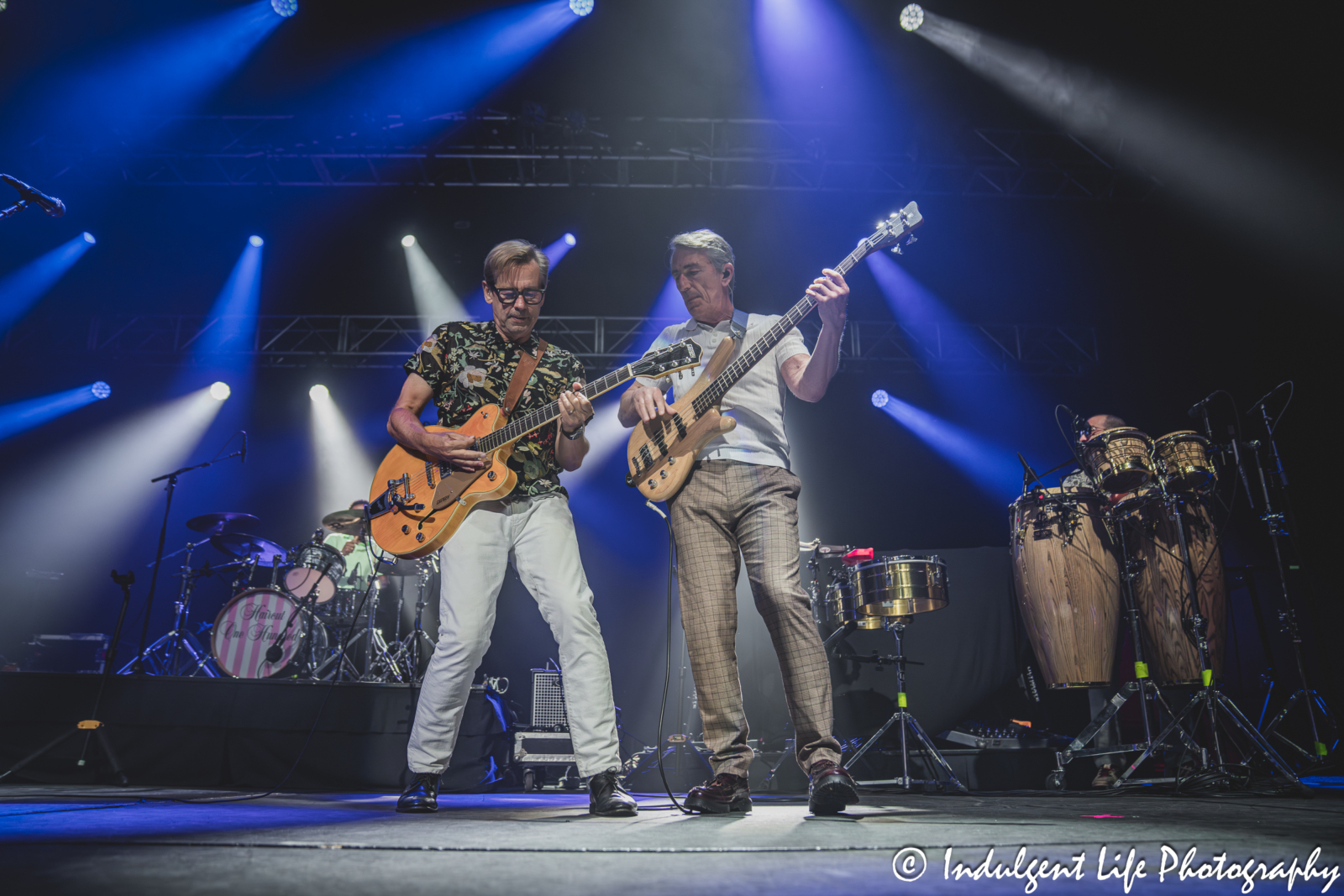 Haircut One Hundred lead singer Nick Heyward and bass guitarist Les Nemes performing "Kingsize (You're My Little Steam Whistle)" together at Star Pavilion inside of Ameristar Casino in Kansas City, MO on September 13, 2025.