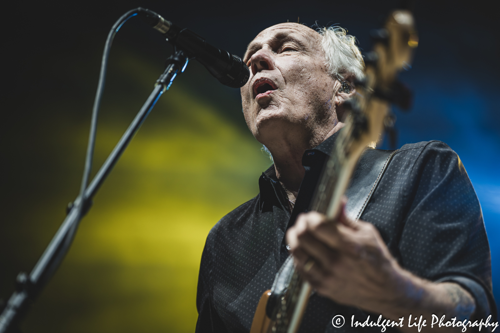 Frontman and bass guitarist Wayne Nelson of Little River Band performing "Help Is On the Way" live in concert at Azura Amphitheater in Bonner Springs, KS on September 25, 2025.