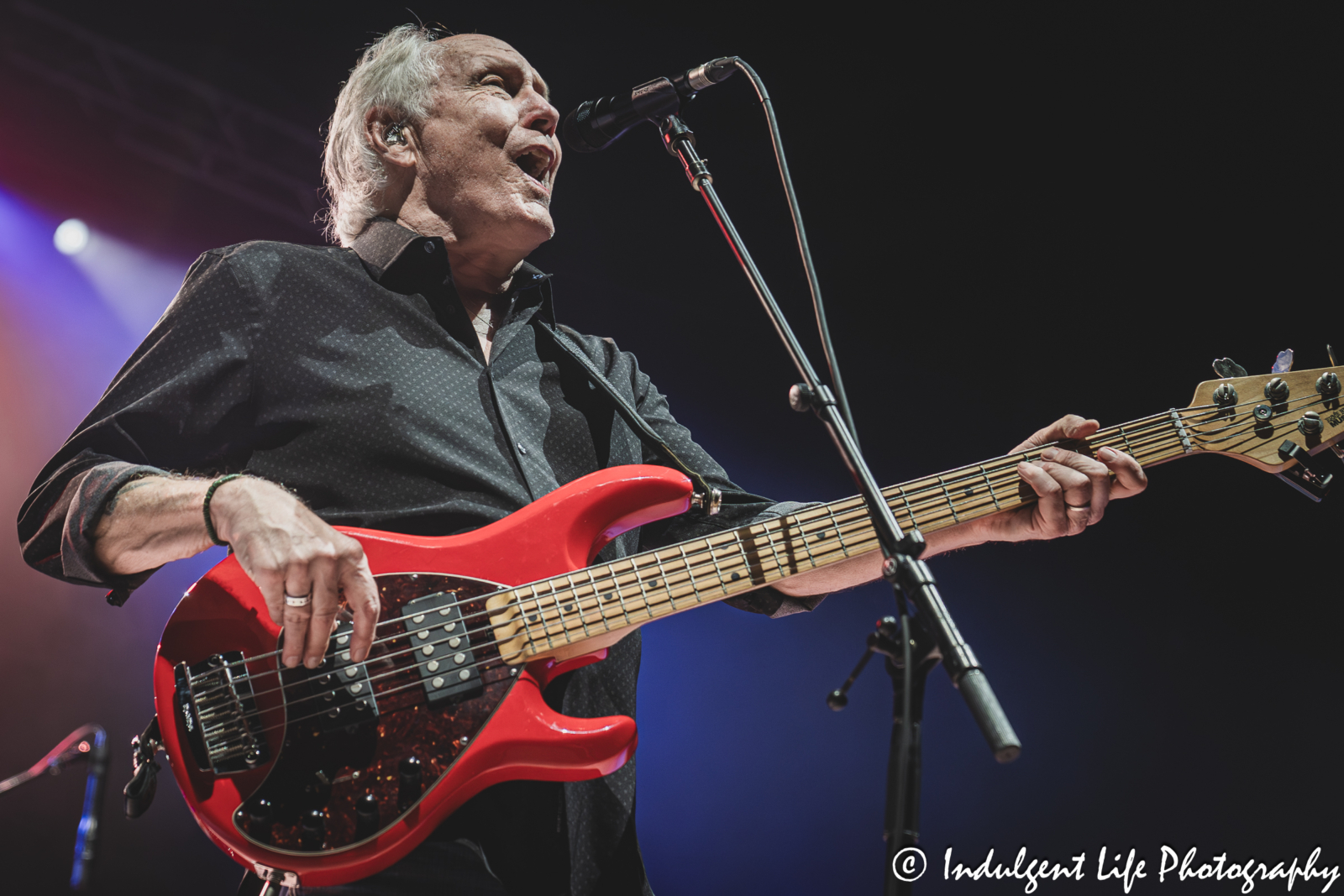 Lead singer and bass guitarist Wayne Nelson of Little River Band performing "Night Owls" live in concert at Azura Amphitheater in Bonner Springs, KS on September 25, 2025.