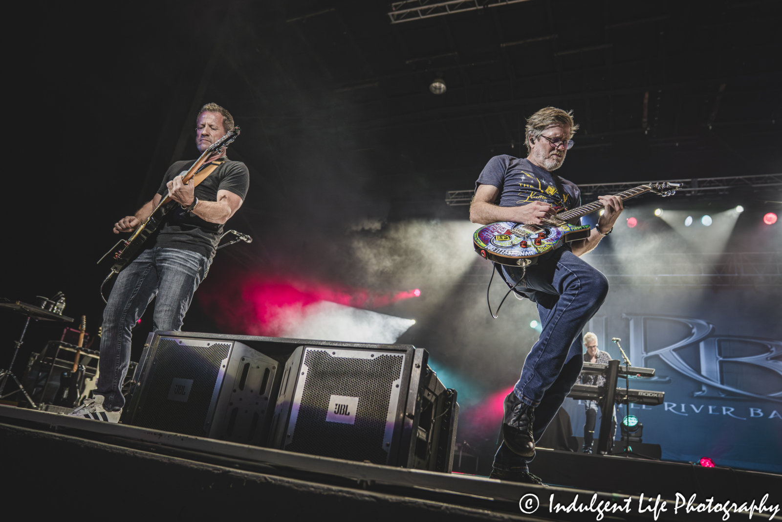 Guitar players Colin Whinnery and Bruce Wallace of Little River Band live in concert performing "Lonesome Loser" together at Azura Amphitheater in Bonner Springs, KS on September 25, 2025.