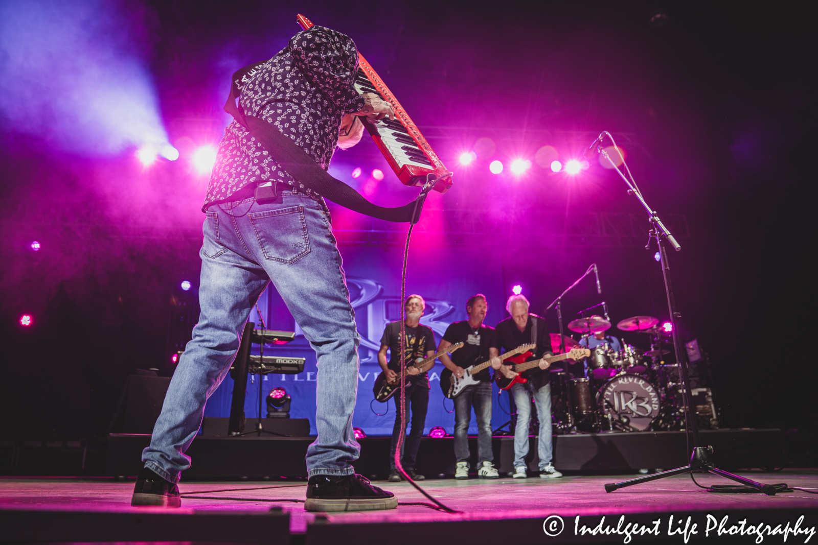 Keyboard player Chris Marion of Little River Band playing the keytar live in concert at Azura Amphitheater in Bonner Springs, KS on September 25, 2025.