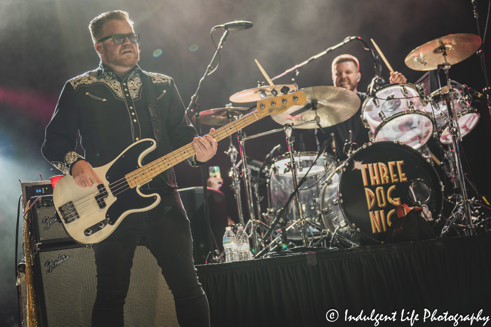 Three Dog Night founding member Danny Hutton's sons Timothy Hutton on bass and Dash Hutton on drums at Azura Amphitheater in Bonner Springs, KS on September 25, 2025.