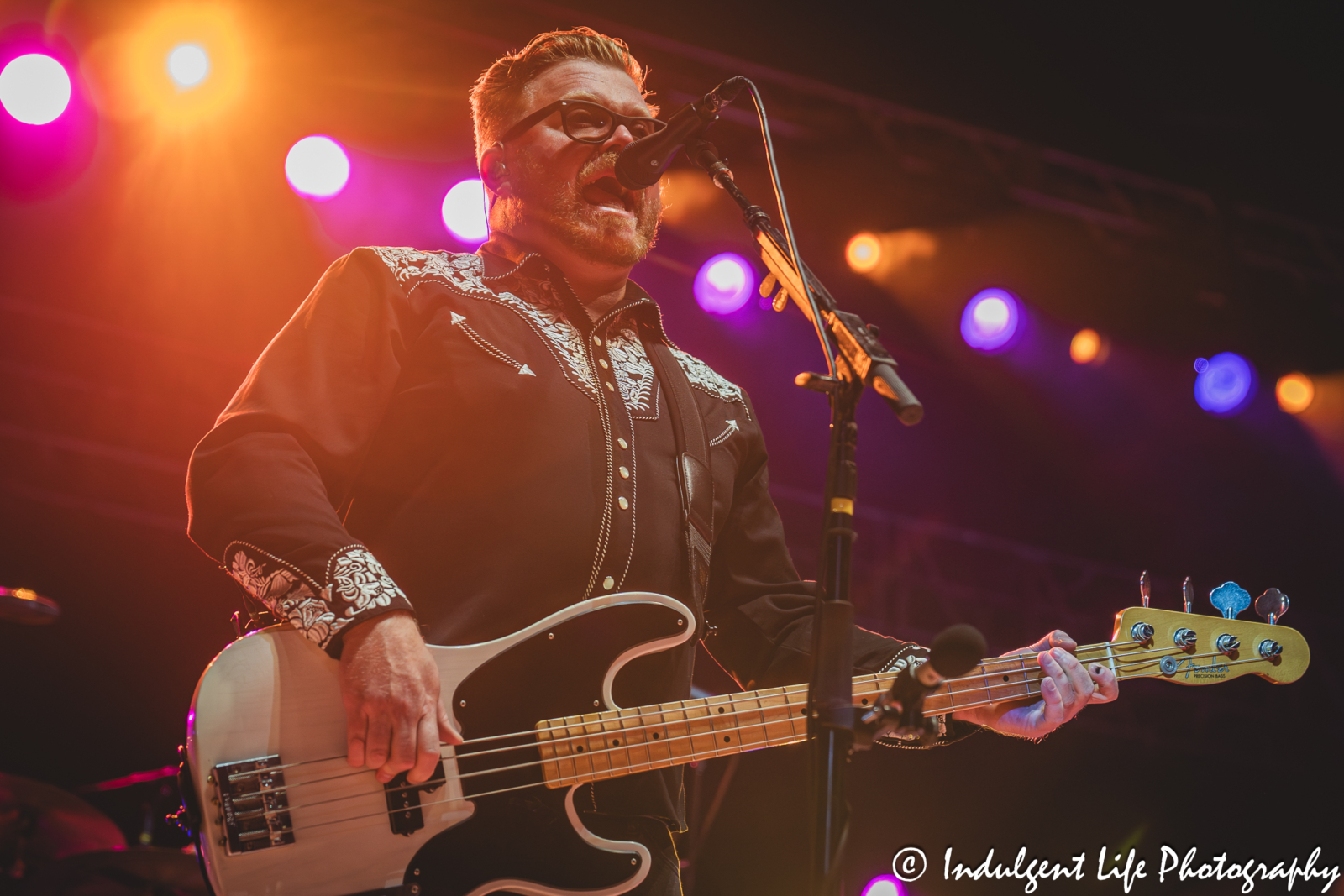 Bass guitar player Timothy Hutton of Three Dog Night live in concert at Three Dog Night live on stage at Azura Amphitheater in Bonner Springs, KS on September 25, 2025.