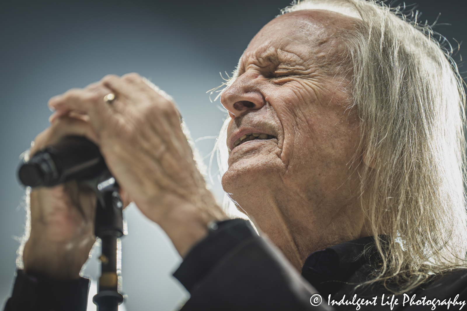 Three Dog Night vocalist David Morgan singing the acoustic guitar live at Azura Amphitheater in Bonner Springs, KS on September 25, 2025.