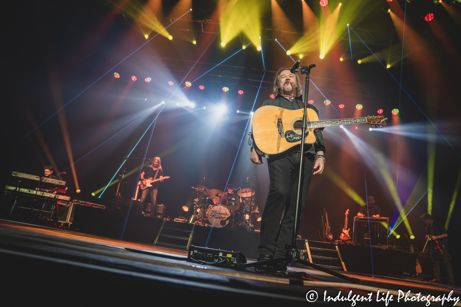 Travis Tritt and his band performing "The Whiskey Ain't Workin'" live in concert at Ameristar Casino's Star Pavilion in Kansas City, MO on October 18, 2025.