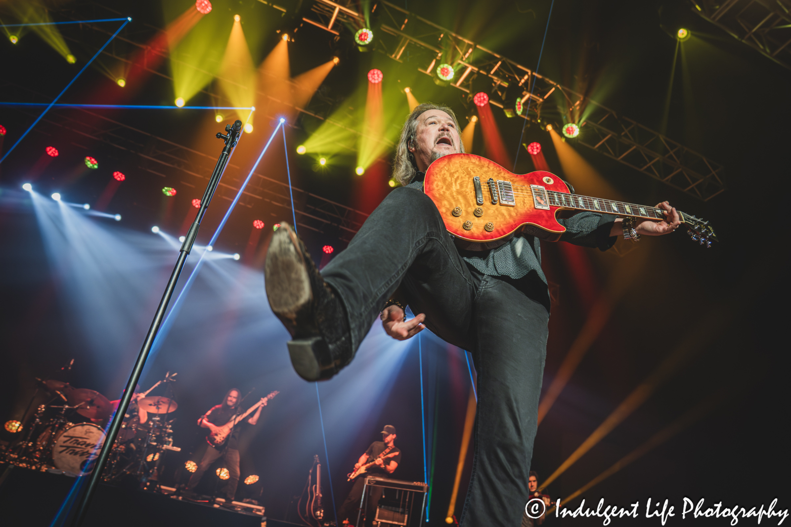 Travis Tritt flicking a guitar pick into the crowd as he performed live at Star Pavilion inside of Ameristar Casino in Kansas City, MO on October 18, 2025.