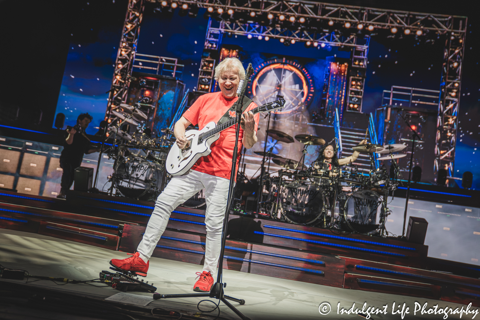 Frontman Rik Emmett of Triumph performing "When the Lights Go Down" with band member Brent Fitz at Starlight Theatre in Kansas City, MO on May 16, 2026.