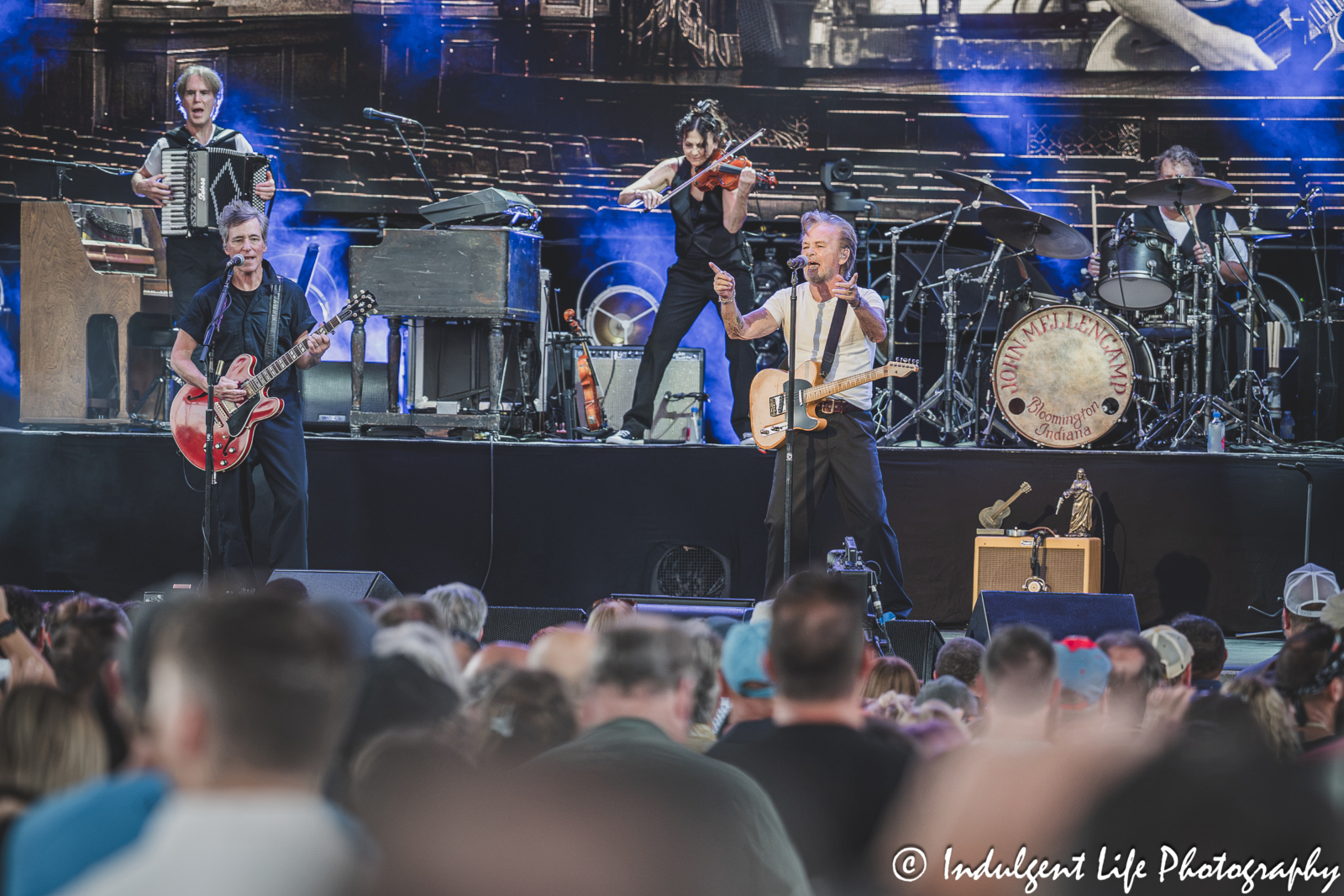 John Mellencamp and his band live in concert performing "Minutes to Memories" at Morton Amphitheater in Riverside, MO on July 13, 2026.